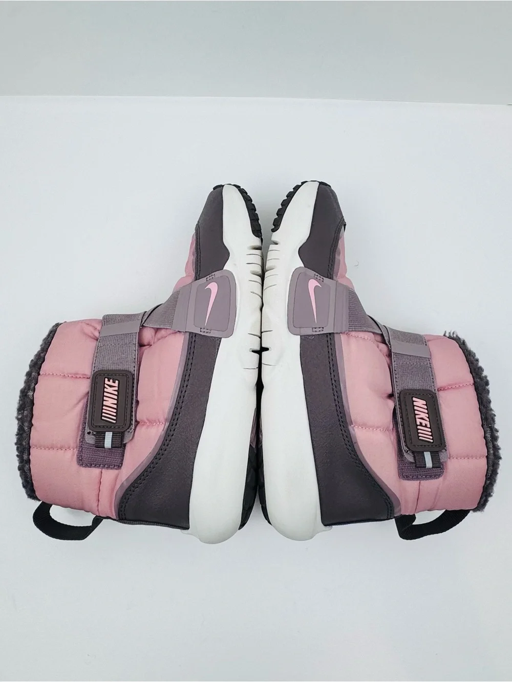 Nike Flex Advance boots. Size 3Y. Quilted textile upper with fleece lining. Pink